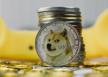 Dogecoin logo and cryptocurrency market chart