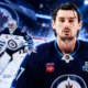 Connor Hellebuyck public Winnipeg Jets trade request